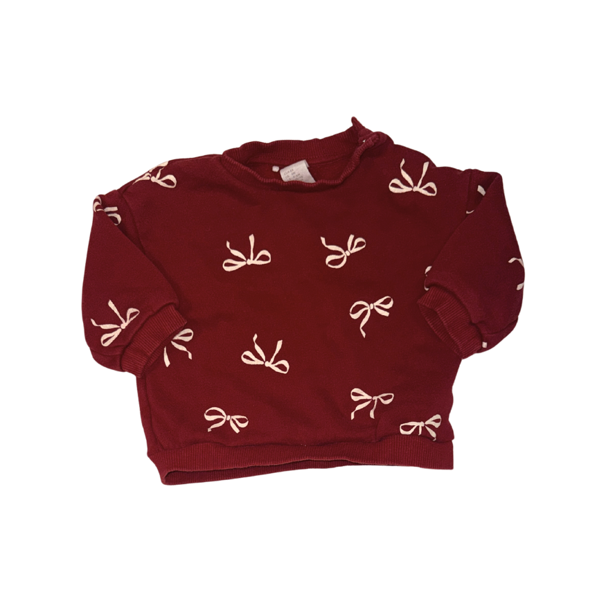 Red sweatshirt with bows pattern | 4-6M